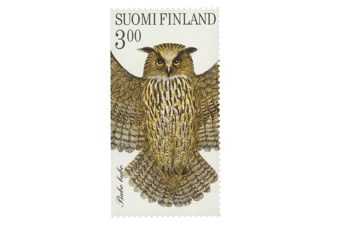 piirretty kuva pöllöstä postimerkissä.