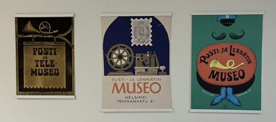 kolme julistetta vierekkäin seinällä